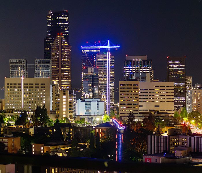 A city skyline at night.