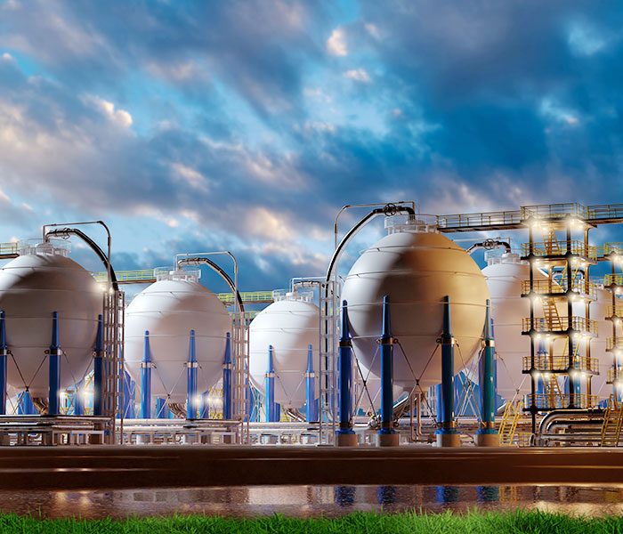 Large white tanks at an electrical plant.